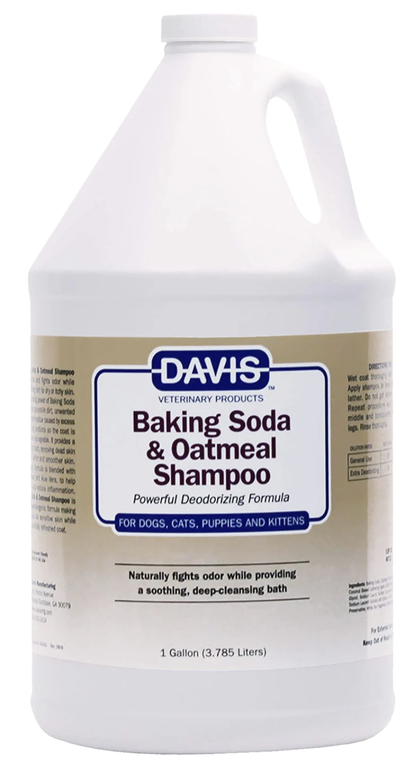 One Gallon White bottle filled with Davis Baking Soda And Oatmeal Shampoo that is good for Deodorizing 
