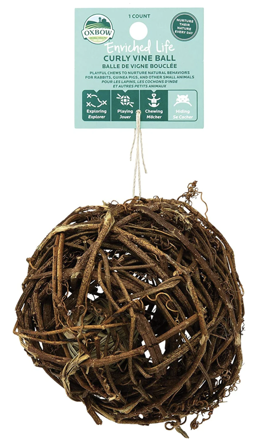 Green packaging with a branch ball toy for small animal by oxbow
